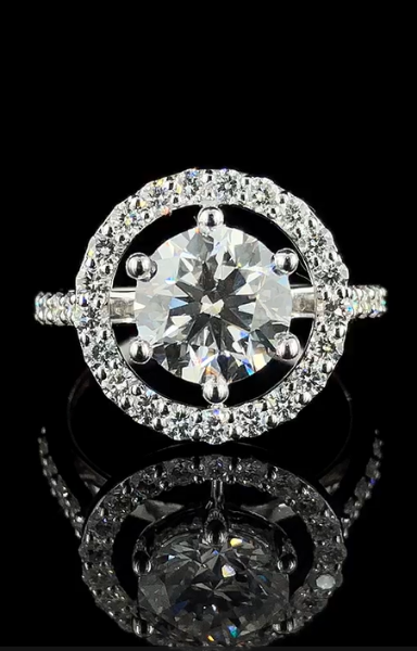 Picture of 2 carat solitaire Round Diamond  Ring In Halo Setting.