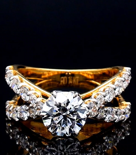 Picture of 2 Carat solitaire and smaller Diamonds Lining the Criss Crossing band.
