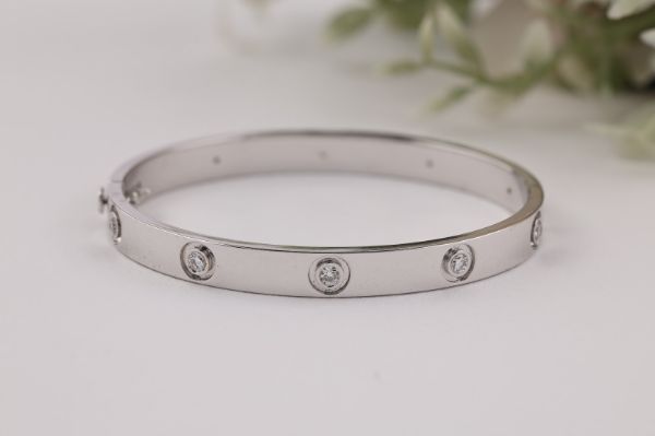 Picture of A Sleek Cartier-Inspired Bracelet Adorned with Round Diamonds.