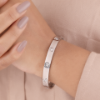 Picture of A Sleek Cartier-Inspired Bracelet Adorned with Round Diamonds.