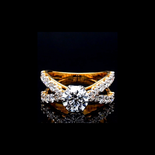 Picture of 2 Carat solitaire & smaller Diamonds Lining the Criss Crossing band.